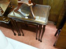 Nest of three reproduction coffee tables with glass tops