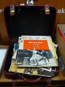 Suitcase with an assortment of LP records including Jim Reeves, Black & White Minstrel Show, West