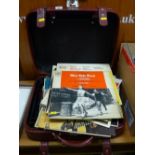 Suitcase with an assortment of LP records including Jim Reeves, Black & White Minstrel Show, West