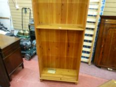 Good floor standing pine open bookcase with inserts