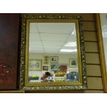 Gilt framed bevelled wall mirror