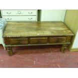 Rustic and carved coffee table with central drawers