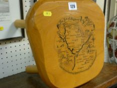 Milking stool with print of Anglesey destinations on the seat