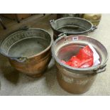 Three copper buckets with iron handles