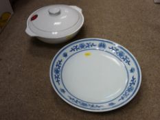 Blue and white dish and tureen cover, both having the emblem for The People's Republic of China