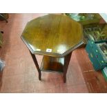 Hexagonal topped two tier mahogany occasional table