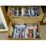 Two boxes with generous quantity of recent DVD titles