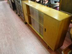 Mid 20th Century floor standing bookcase with glass centre sliding doors