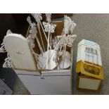 Box containing butterfly patterned menu holders etc