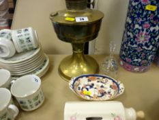 Brass oil lamp with glass bowl shade, Masons Mandalay small oval dish and a pottery rolling pin