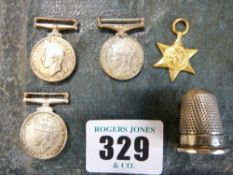 Set of four Second World War dress medals and a silver thimble