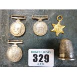 Set of four Second World War dress medals and a silver thimble