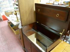 Stag Minstrel cocktail cabinet and a similar era floor standing corner cupboard