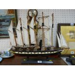 Model of a galleon ship on a plinth