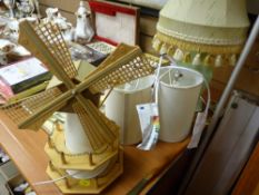 Windmill table lamp, green pottery table lamp and two others