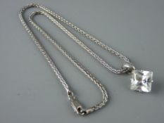 A SILVER TWIST NECK CHAIN with a large Celtic mounted cubic zircon pendant, 925 stamps, 15.5 grms