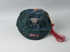 A RUGBY UNION VELVET SCHOOL/HONOUR'S CAP, dark green with embroidered date and lettering including a