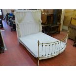 AN R W WINFIELD & CO VICTORIAN BRASS & IRON BED, the raised section with curtain rail, the bowed