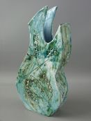 LYNDA WAGGETT STYLIZED STUDIO POTTERY VASE of wavy form with incised decoration and semi-lustre