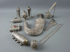 A COLLECTION OF EASTERN WHITE METAL ORNAMENTAL WARE including a kukri style dagger and one other,