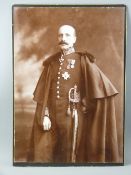 AN OLD SEPIA PHOTOGRAPH of a standing uniformed Germanic Prince, 36 x 26 cms