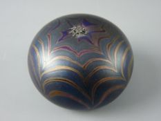 A KRIS HEATON ART GLASS PAPERWEIGHT, purple iridescent spider web design with applied sterling