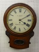 A POLISHED ENCASED PENDULUM WALL CLOCK with circular dial, Roman numerals, marked 'W Gent, Newton