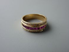 A FOURTEEN CARAT GOLD RUBY & DIAMOND HALF HOOP DRESS RING having nine square faceted rubies with a