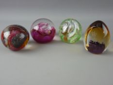 FOUR PAPERWEIGHTS by Caithness and Pauline Solven Cowdy titled 'Fireball', marked and number A13734,