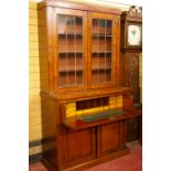 A VICTORIAN MAHOGANY SECRETAIRE BOOKCASE, the upper section having twin twelve pane leaded glazed