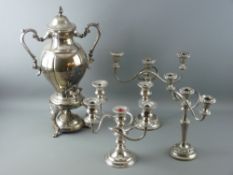 A SUBSTANTIAL ELECTROPLATE SAMOVAR, a pair of circular based three branch electroplate candelabra