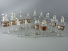 A PARCEL OF APPROXIMATELY THIRTEEN CHEMIST'S PLAIN GLASS BOTTLES, six having Latin labels
