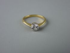 A LADY'S GOLD (UNMARKED) DIAMOND SOLITAIRE DRESS RING, visual estimate of diamond 0.5 carat 2.7 grms