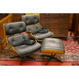 A CHARLES & RAY EAMES STYLE SUITE OF TWO ARMCHAIRS AND A FOOTSTOOL, an iconic style set in shaped