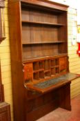 AN EDWARDIAN MAHOGANY SECRETAIRE BOOKCASE, the open top with adjustable shelves, the centre having a