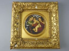 19th CENTURY oil on alabaster, circular format - young mother cradling two children, 18.5 cms