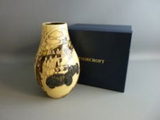 A MOORCROFT 'ASTON HILL CLIMB' VASE, designed by Paul Hilditch, decorated on a cream ground,