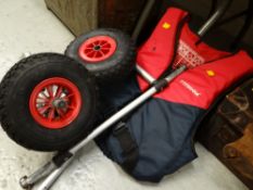 A Typhoon life jacket & a canoe / kayak caddy