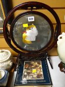 Chinese hardwood circular framed embroidery of a cat together with a copy of 'Collecting: The