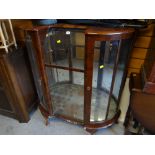 A polished china cabinet, a leather (or effect) pouffe, sundry bamboo, rattan tables etc