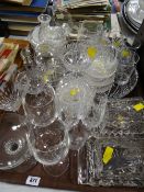 A tray of various glassware including drinking glasses, butter dishes etc