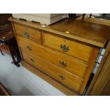 A vintage lightwood chest of two long & two short drawers