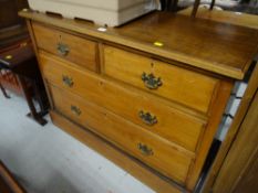 A vintage lightwood chest of two long & two short drawers