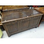 An early nineteenth century carved oak coffer chest with inscribed initials SLI