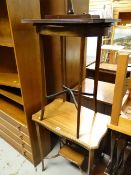 An Edwardian mahogany shaped-top coffee table, a reproduction tripod table & another