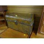 A small metal vintage tin trunk