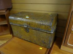 A small metal vintage tin trunk