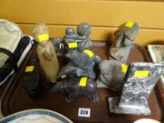 A collection of Inuit stone carved animals & figures