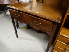 A nineteenth century oak lowboy with single drawer & shaped frieze