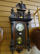 An antique Vienna-style wall clock